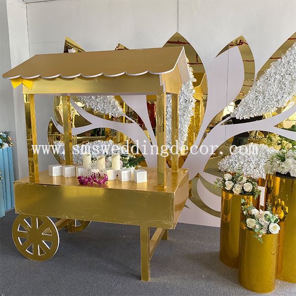 Carro de caramelos dorados
