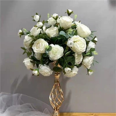 Centro de mesa con flores blancas